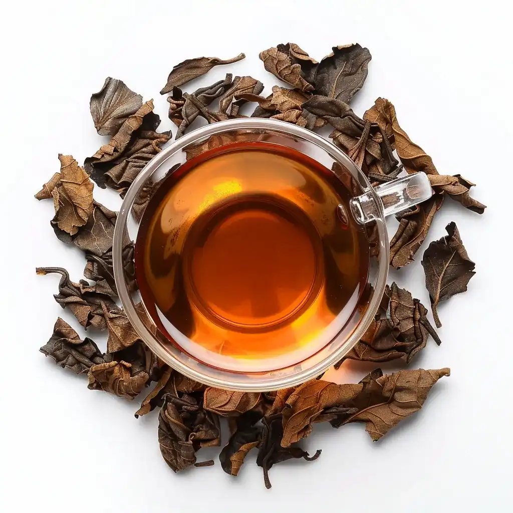 a glass cup filled with pu-erh tea