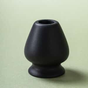 Ceramic chasen holder in matte black unglazed stoneware for bamboo matcha whisk, minimalist, hand-finished